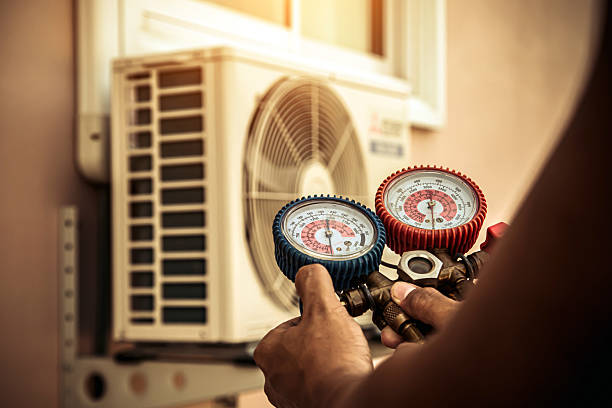 Professional Heat Pump Repair technician working in Fairview, NY